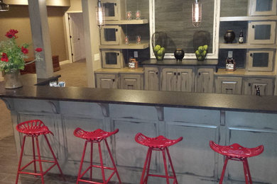 Example of a cottage chic home bar design in Kansas City