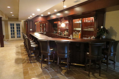 Inspiration for a large timeless single-wall carpeted and beige floor seated home bar remodel in Newark with beaded inset cabinets, dark wood cabinets and wood countertops