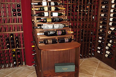 Example of an arts and crafts wine cellar design in Atlanta