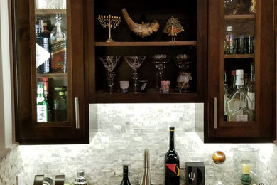 Inspiration for a home bar remodel in Houston