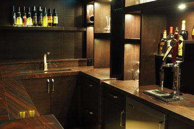 This is an example of a medium sized contemporary galley breakfast bar in Miami with open cabinets, dark wood cabinets, wood worktops, multi-coloured splashback, stone slab splashback and ceramic flooring.