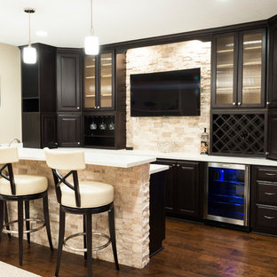 Basement Bar with Wood Flooring and Stone Wall