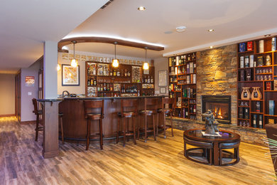 Example of a large minimalist home bar design in Vancouver