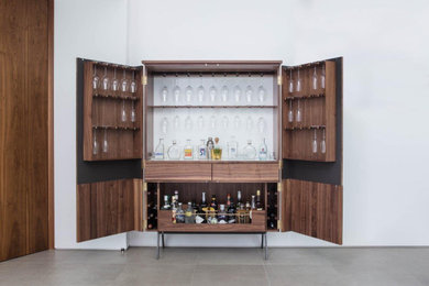 Inspiration for a medium sized contemporary home bar in London.
