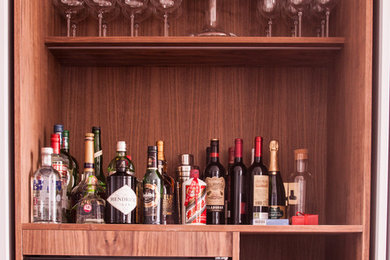 Photo of a contemporary home bar in London.