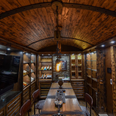 Large mountain style u-shaped medium tone wood floor and brown floor seated home bar photo in Edmonton with raised-panel cabinets, dark wood cabinets, wood countertops, brown backsplash, wood backsplash and brown countertops