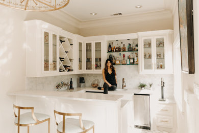 Inspiration for a transitional home bar remodel in Dallas with white cabinets