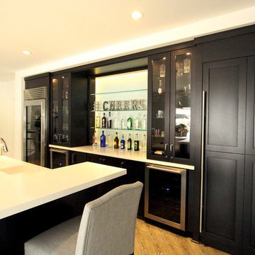 Dark Stained Maple Cabinets in Basement Bar with Full Sized 36 SubZero Pro Refri
