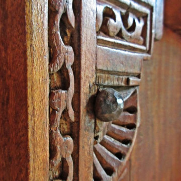 Detailed Wood Carving with Iron Clavos on Rustic Southwest Mission Style Bar