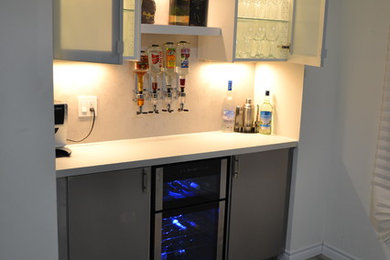 Inspiration for a contemporary home bar remodel in Toronto