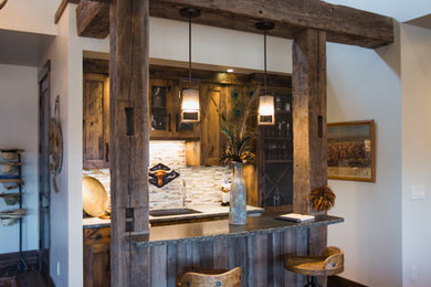 Home bar - rustic home bar idea in Denver