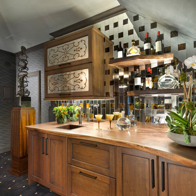 Wet bar - transitional single-wall wet bar idea in New York with a drop-in sink, shaker cabinets, medium tone wood cabinets and mirror backsplash