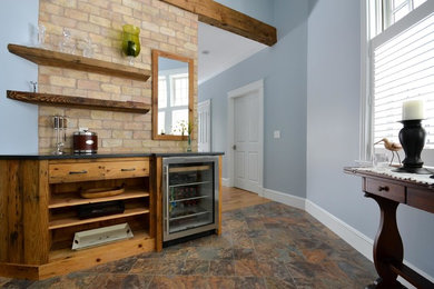 Inspiration for a transitional home bar remodel in Portland Maine