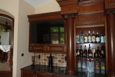 This is an example of a home bar in Boston.