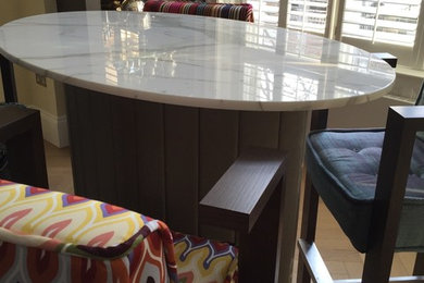 Design ideas for a home bar in Berkshire with marble worktops.