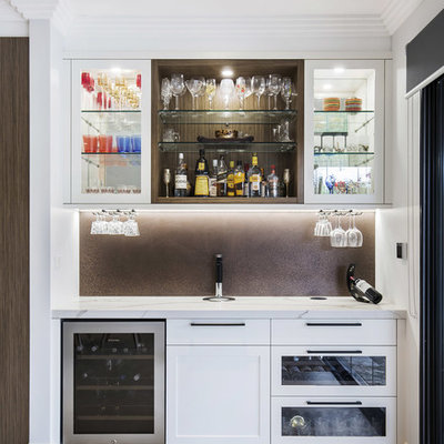 Small minimalist single-wall limestone floor and beige floor wet bar photo in Sydney with shaker cabinets, white cabinets, quartz countertops, no sink, brown backsplash and metal backsplash