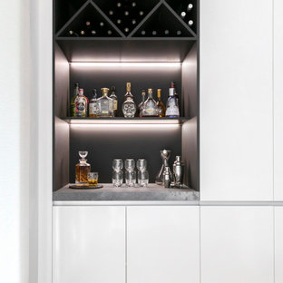 Design ideas for a contemporary home bar in Sydney.