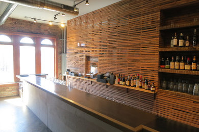 Inspiration for a rustic home bar remodel in Chicago
