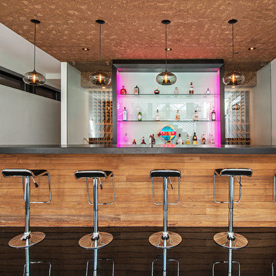 Inspiration for a contemporary galley seated home bar remodel in Chicago with open cabinets