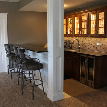 Lower Level Remodel With Home Bar, Spa-like Suite, Craft Room , and Home Gym