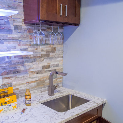 Inspiration for a large contemporary galley porcelain tile wet bar remodel in New York with an undermount sink, shaker cabinets, dark wood cabinets, granite countertops, multicolored backsplash and stone tile backsplash