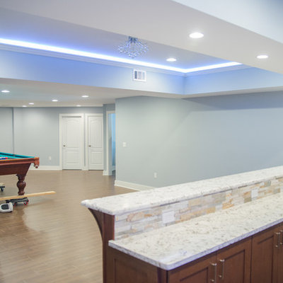 Wet bar - large contemporary galley porcelain tile wet bar idea in New York with an undermount sink, shaker cabinets, dark wood cabinets, granite countertops, multicolored backsplash and stone tile backsplash