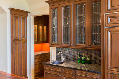 Example of an eclectic home bar design in Kansas City