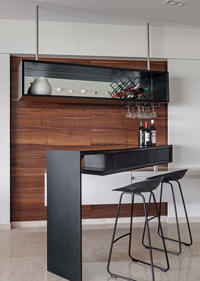 Contemporary Home Bar by AVN Interiors