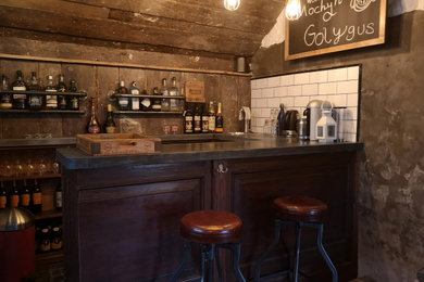 Rustic home bar in Other.