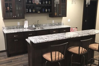 Example of a trendy home bar design in Minneapolis