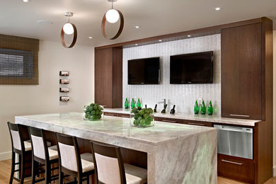 Seated home bar - contemporary light wood floor seated home bar idea in Other with flat-panel cabinets, dark wood cabinets and white backsplash