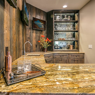Example of a mid-sized mountain style u-shaped seated home bar design in Other with an undermount sink, open cabinets, dark wood cabinets, granite countertops, brown backsplash, wood backsplash and brown countertops