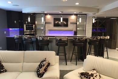 Example of a large trendy u-shaped ceramic tile and white floor seated home bar design in Other with stone tile backsplash, an undermount sink, flat-panel cabinets, dark wood cabinets, stainless steel countertops and beige backsplash