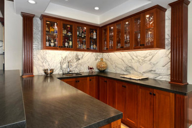 Inspiration for a transitional home bar remodel in Orange County