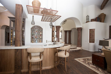 Photo of a large eclectic galley breakfast bar in Phoenix with quartz worktops, dark hardwood flooring, open cabinets, multi-coloured splashback, mosaic tiled splashback and a submerged sink.