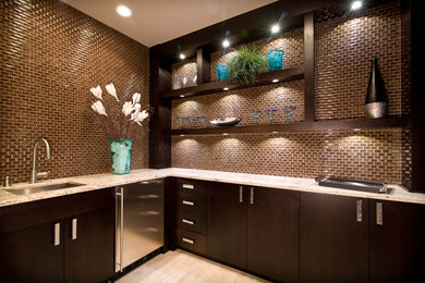 Inspiration for a mid-sized modern l-shaped beige floor wet bar remodel in Denver with an undermount sink, flat-panel cabinets, dark wood cabinets, granite countertops and brown backsplash