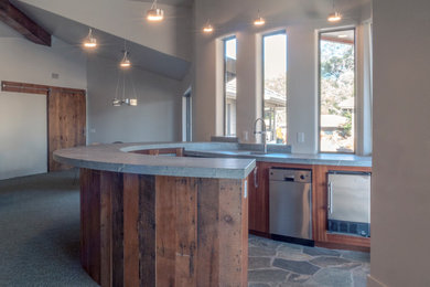 Example of an arts and crafts home bar design in Sacramento
