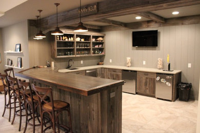 Example of a mid-sized mountain style u-shaped ceramic tile and beige floor seated home bar design in Philadelphia with an undermount sink, open cabinets, distressed cabinets, wood countertops, gray backsplash and wood backsplash