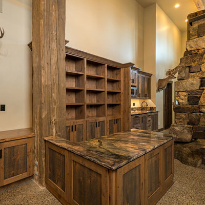 Example of a mid-sized mountain style u-shaped concrete floor and multicolored floor wet bar design in Seattle with an undermount sink, recessed-panel cabinets, medium tone wood cabinets, granite countertops and multicolored countertops
