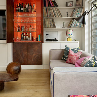 Photo of a contemporary home bar in London.