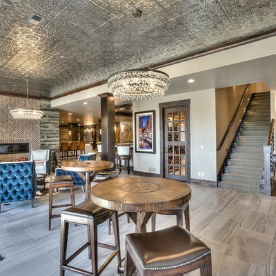 Seated home bar - huge rustic single-wall slate floor seated home bar idea in Denver with an undermount sink, shaker cabinets, dark wood cabinets, granite countertops, red backsplash and stone tile backsplash