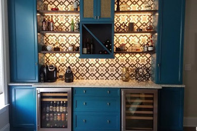 Wet bar - transitional single-wall wet bar idea in San Diego with blue cabinets, ceramic backsplash and recessed-panel cabinets