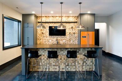 Inspiration for a large industrial breakfast bar in Other with a submerged sink, flat-panel cabinets, grey cabinets, engineered stone countertops, multi-coloured splashback, wood splashback, concrete flooring, blue floors and black worktops.