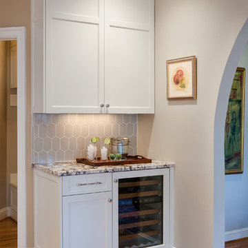 Traditional remodel with walnut island.