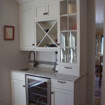Traditional White Kitchen with Dark Island in Wellesley