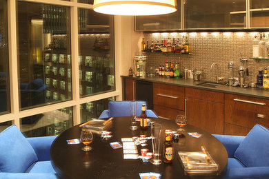 Example of a transitional home bar design in Charlotte