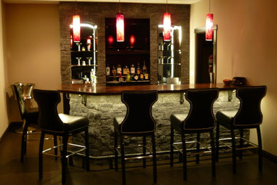 Example of a transitional home bar design in Richmond
