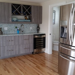 Wet bar and refrigerator in large living room