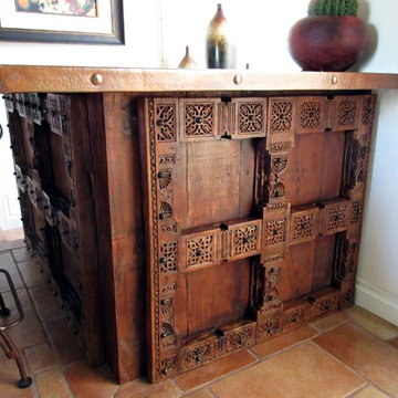 Wood Carving in Mahogany Panels and Copper Countertop on Bar