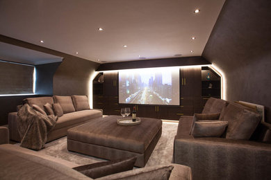 Photo of a contemporary home cinema in Buckinghamshire.